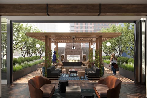 a rendering of a patio with furniture and a fireplace