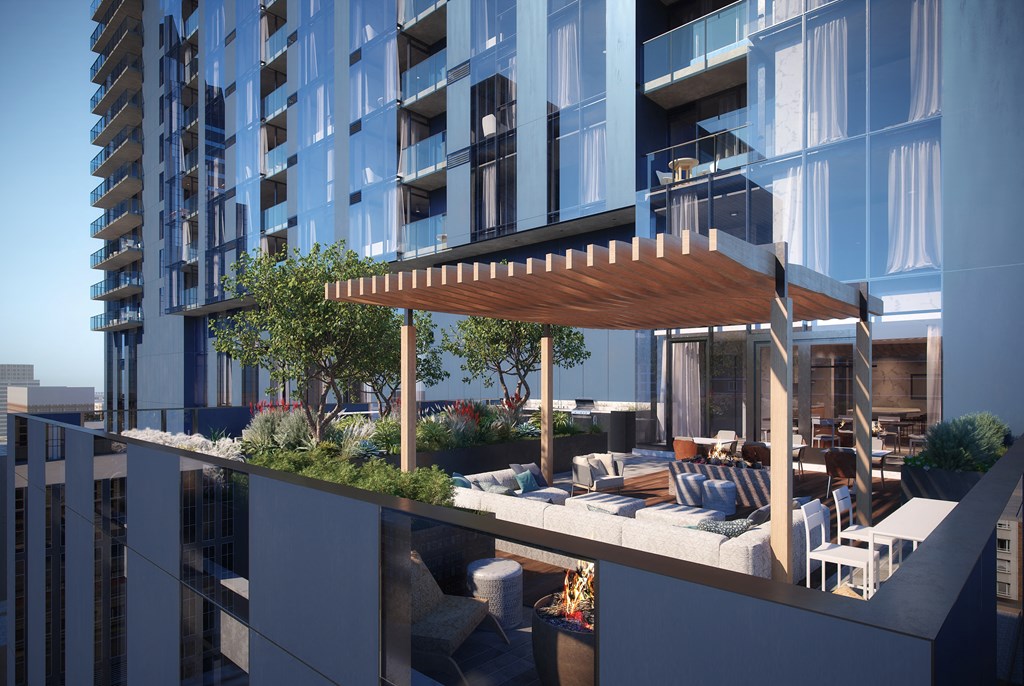 a rendering of an outdoor terrace with a large building in the background