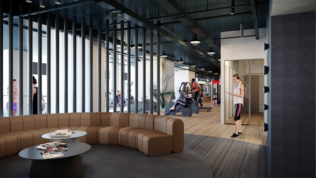 a rendering of a lobby with a couch and a table