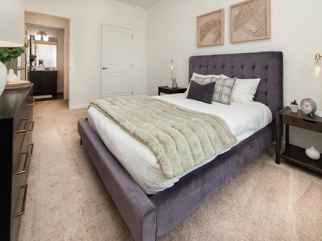 a bedroom with a bed and a dresser at Ardmore at the Trail, Indian Trail, NC, 28079