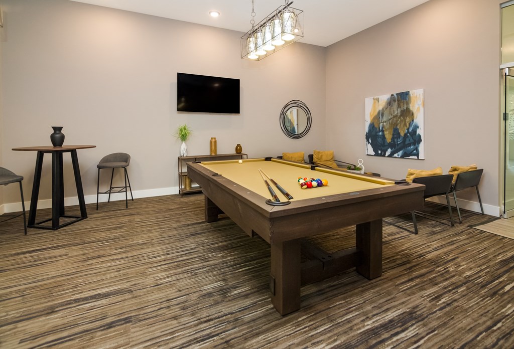 our apartments have a game room with a pool table and flat screen tv  at Ardmore at Bryton, Huntersville