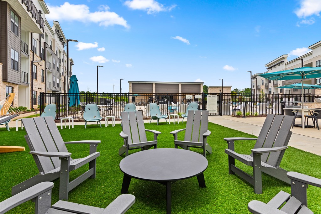 A sunny day at the outdoor seating area at Views at Flowers Apartments, Clayton 27527