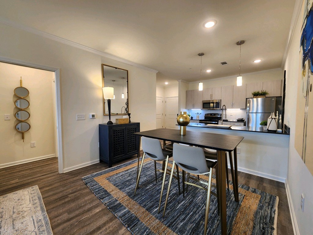 Kitchen and dining room with a table and chairs at Ardmore at Topside in Louisville, TN 37777