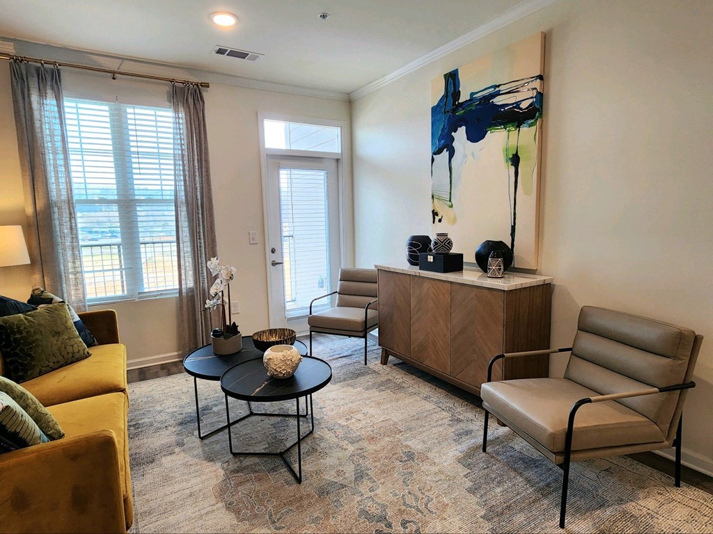 Living room with a couch and chairs at Ardmore at Topside in Louisville, TN 37777