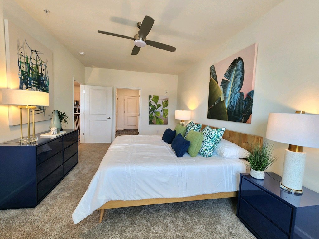 Bedroom with a large bed and a ceiling fan at Ardmore at Topside in Louisville, TN 37777