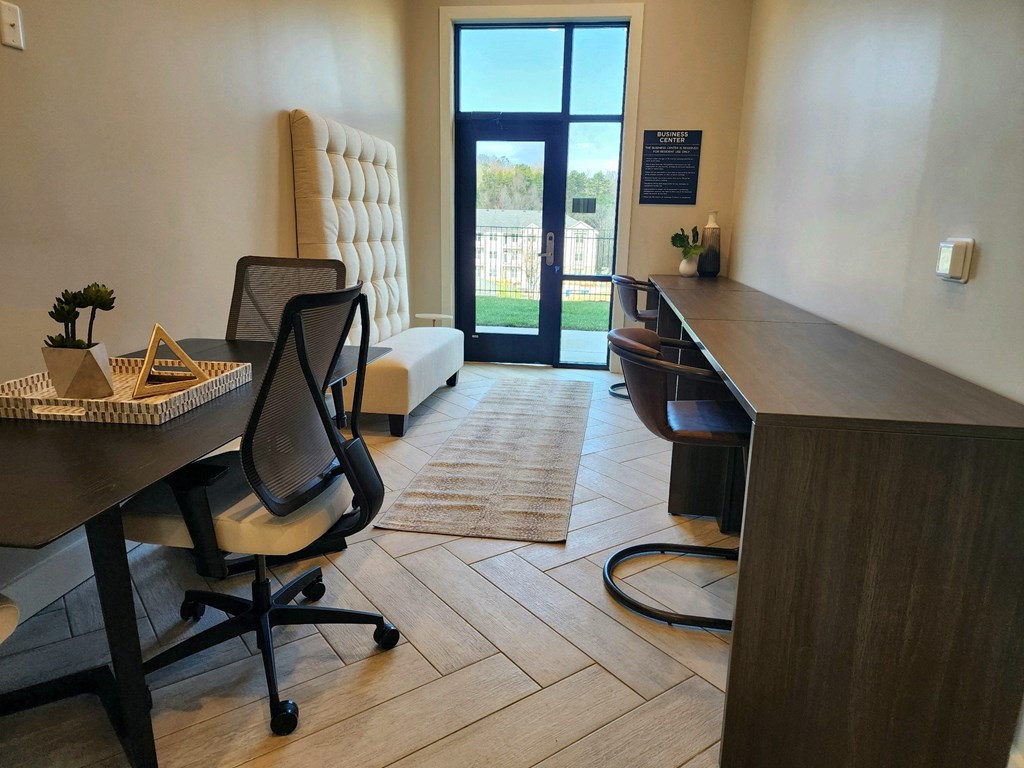 Desk and a chair in a room with a door at Ardmore at Topside in Louisville, TN 37777