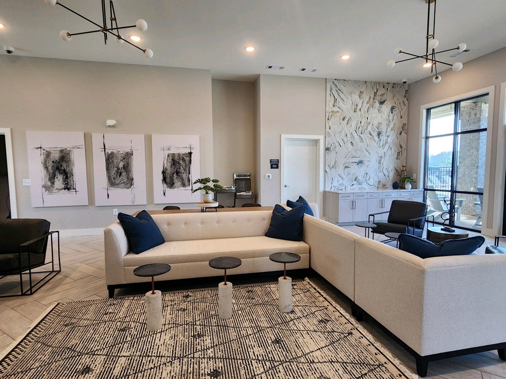 Living room with couches and chairs and a rug at Ardmore at Topside in Louisville, TN 37777
