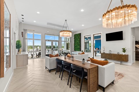 A modern dining room with a wooden table and chairs.