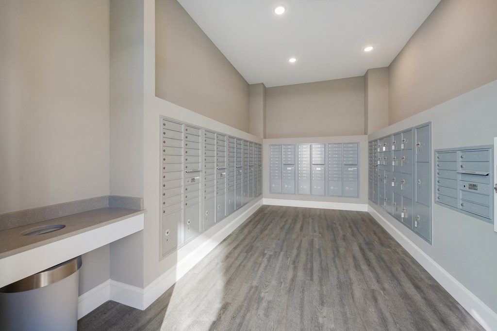 the walk in closet in a new home with lockers