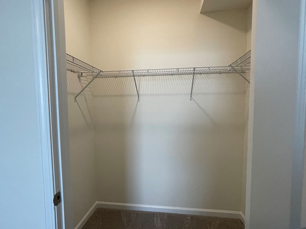 a walk in closet at the historic electric building in fort worth, tx