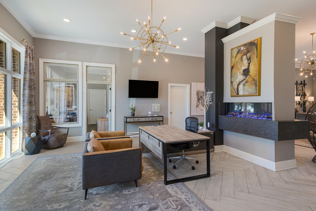 a living room with a fireplace and a table