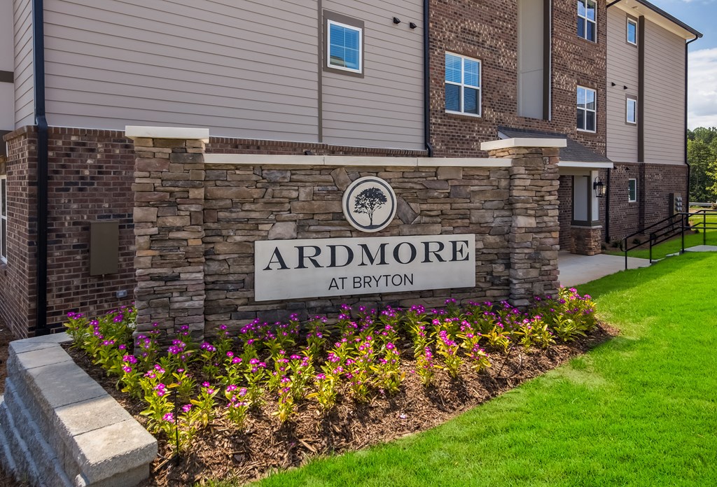 a brick and stone building with a sign that reads ardmore at boston  at Ardmore at Bryton, North Carolina