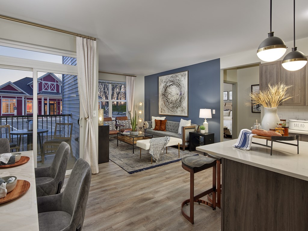 an open floor plan with a kitchen and living room