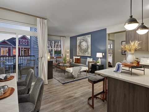 an open floor plan with a kitchen and living room