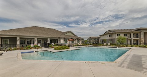 the preserve at ballantyne commons swimming pool with apartment buildings
