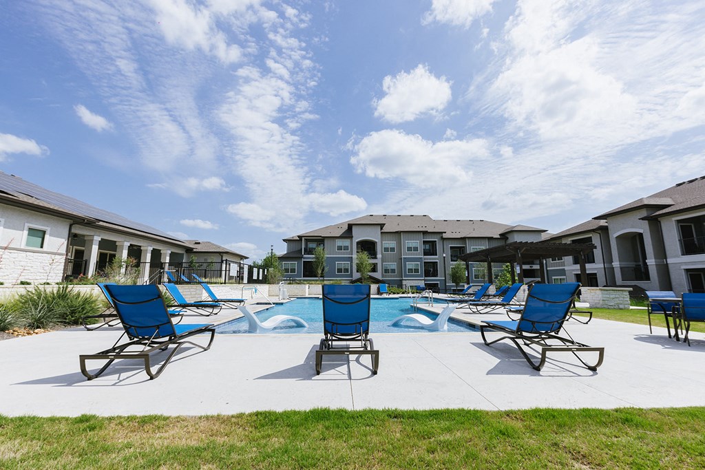 the preserve at ballantyne commons pool with blue lounge chairs