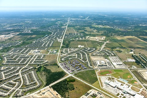 an aerial view of the suburbs of a city