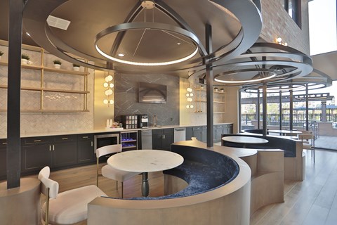 A modern kitchen with a large island in the center.