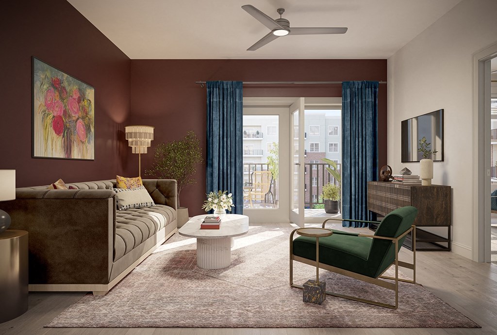 a living room with red walls and a sliding glass door