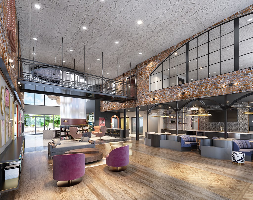 the lobby of a hotel with couches and chairs and a large open lobby area