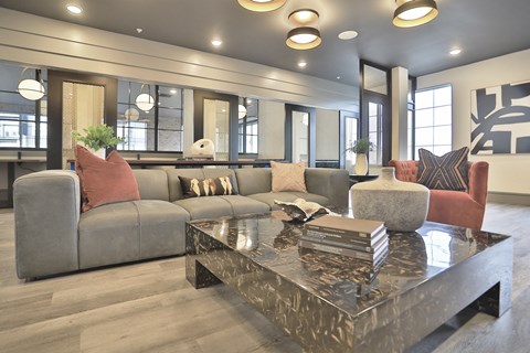 a living room with couches and a coffee table