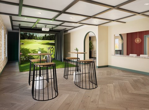 A room with a green wall and a picture of a golf course on the wall.