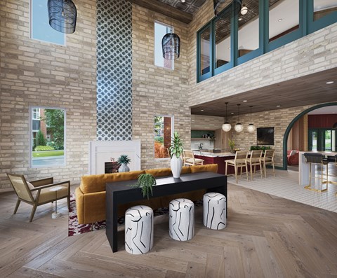 A living room with a fireplace and a dining table.