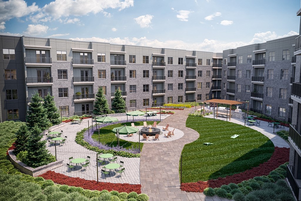 Courtyard with fire pits, grilling stations and pizza oven.