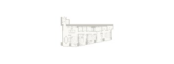 A floor plan of a house with a kitchen, living room, and two bedrooms.