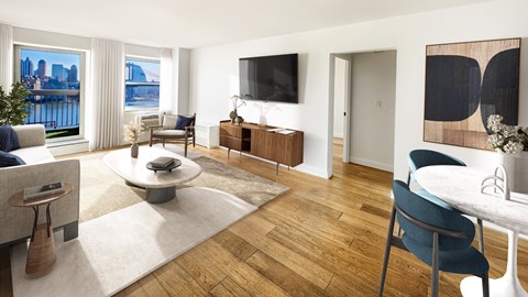 A modern living room with a view of the city.