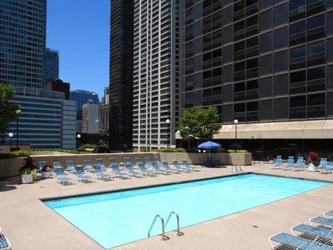 a swimming pool in the middle of a city