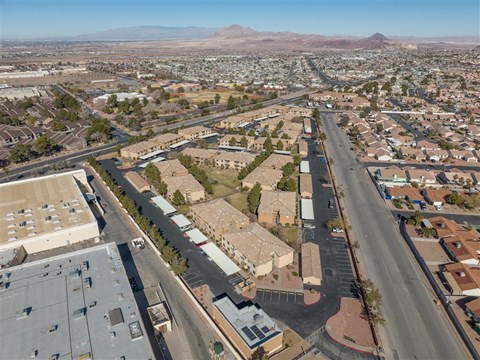 A cityscape with a mountain in the background.