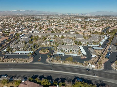 A bird's eye view of a roundabout in a residential area.