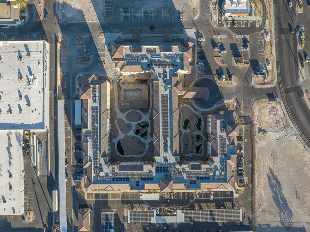 an aerial view of the building in the city