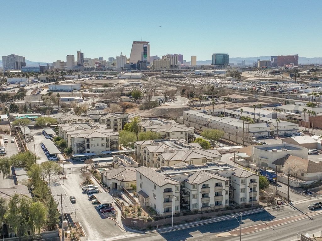 an aerial view of the city with buildings and a city skyline