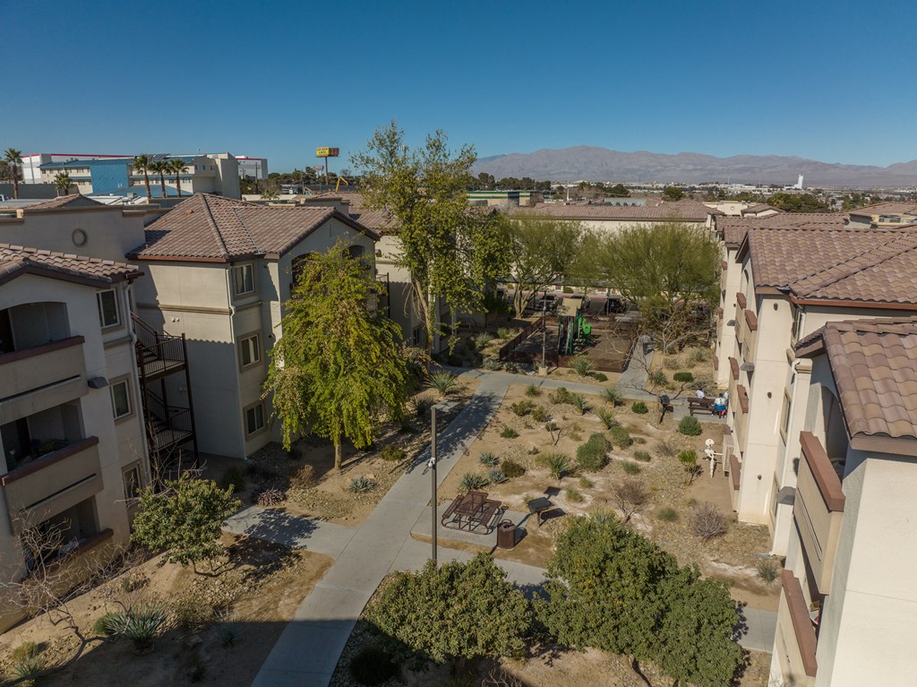 an aerial view of a neighborhood with houses and trees
