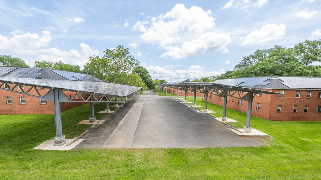 A long pathway with a row of buildings on either side at Eagles Crossing Apartments, Washington 20032
