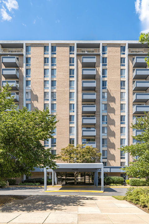 A large building with a lot of windows and balconies.