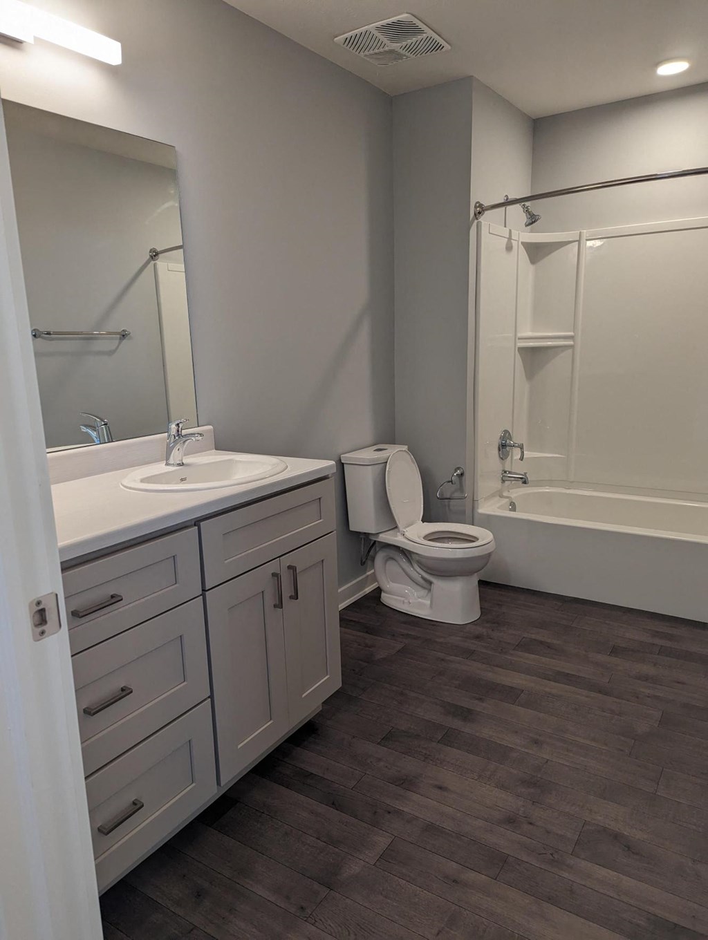 a bathroom with a sink toilet and a shower