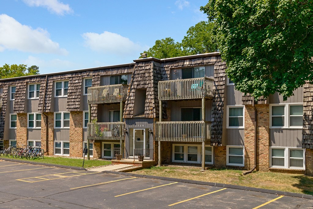 an exterior view of an apartment building with balconies