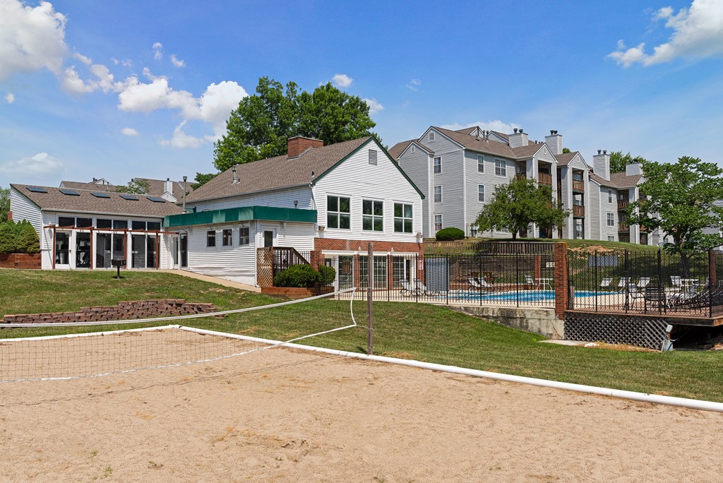 the preserve at ballantyne commons tennis court with apartments in the background