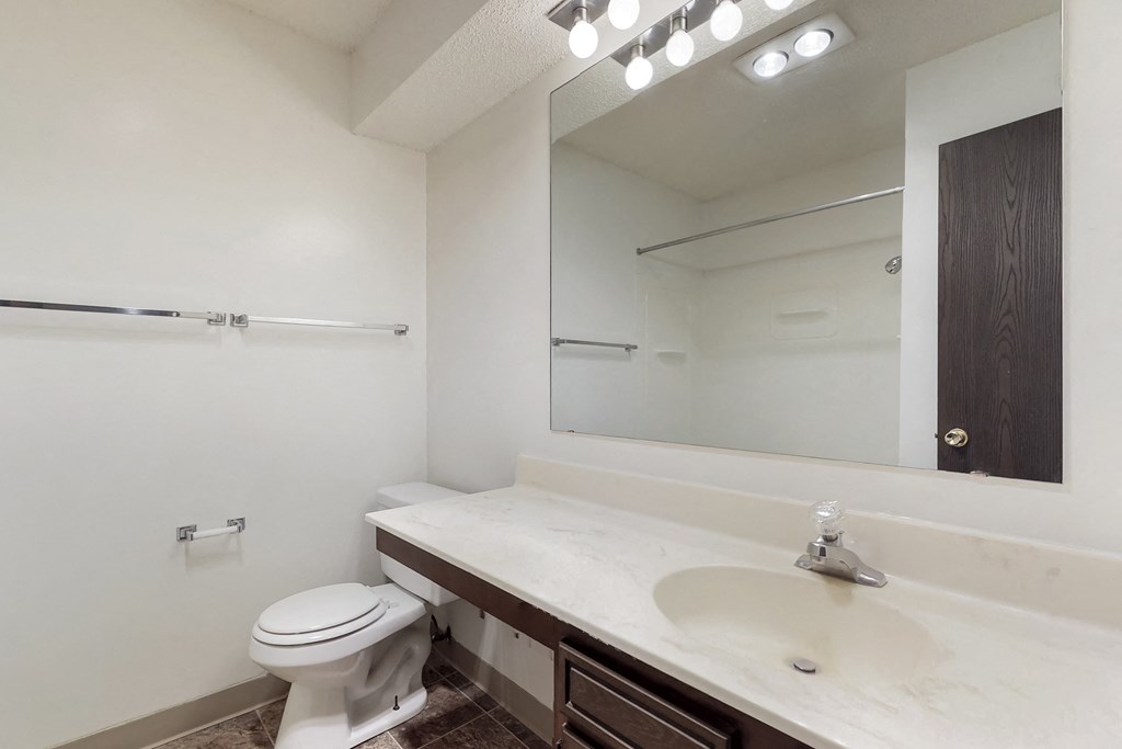 the preserve at ballantyne commons apartment bathroom with sink and toilet