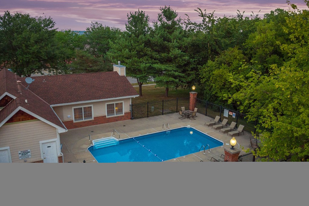 a view of the pool at a house with a swimming pool