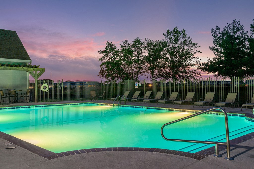 the pool at sunset at the resort at governors crossing