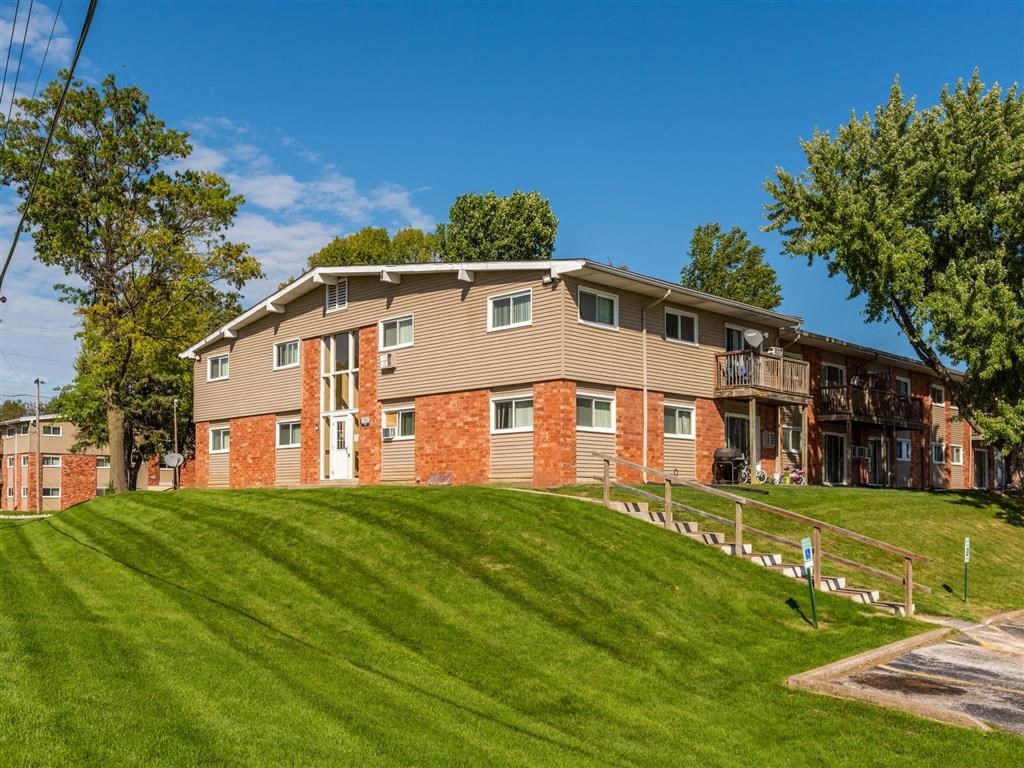 our apartments are located on the top of a grassy hill