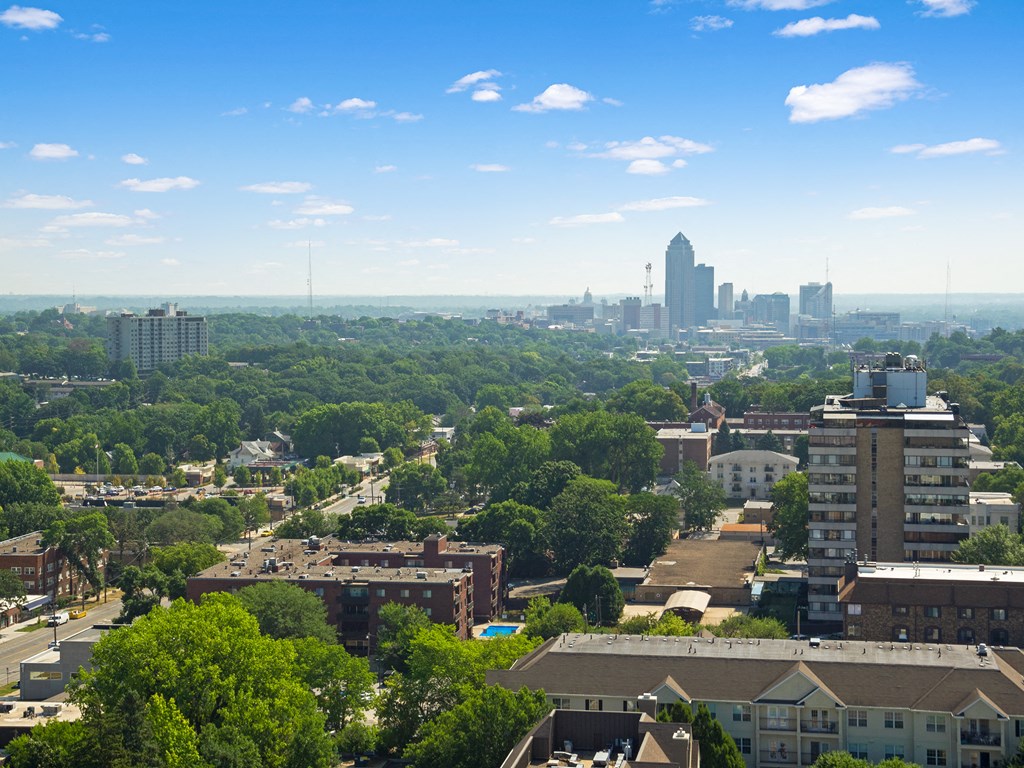 an aerial view of the city with the skyline in the background