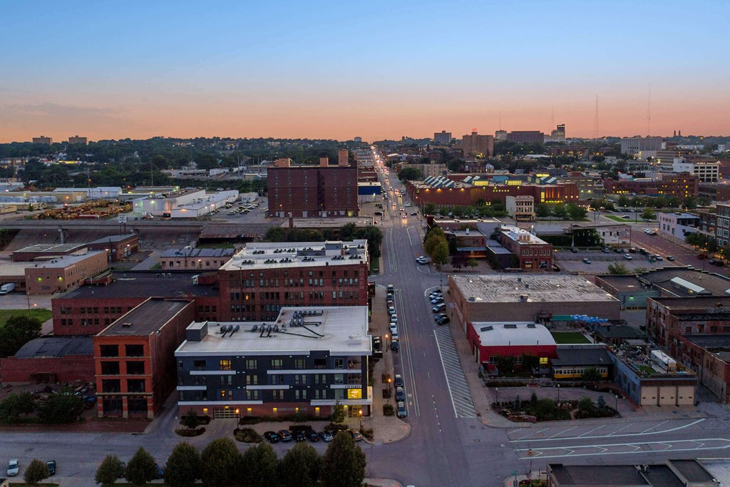 an aerial view of the city at dusk