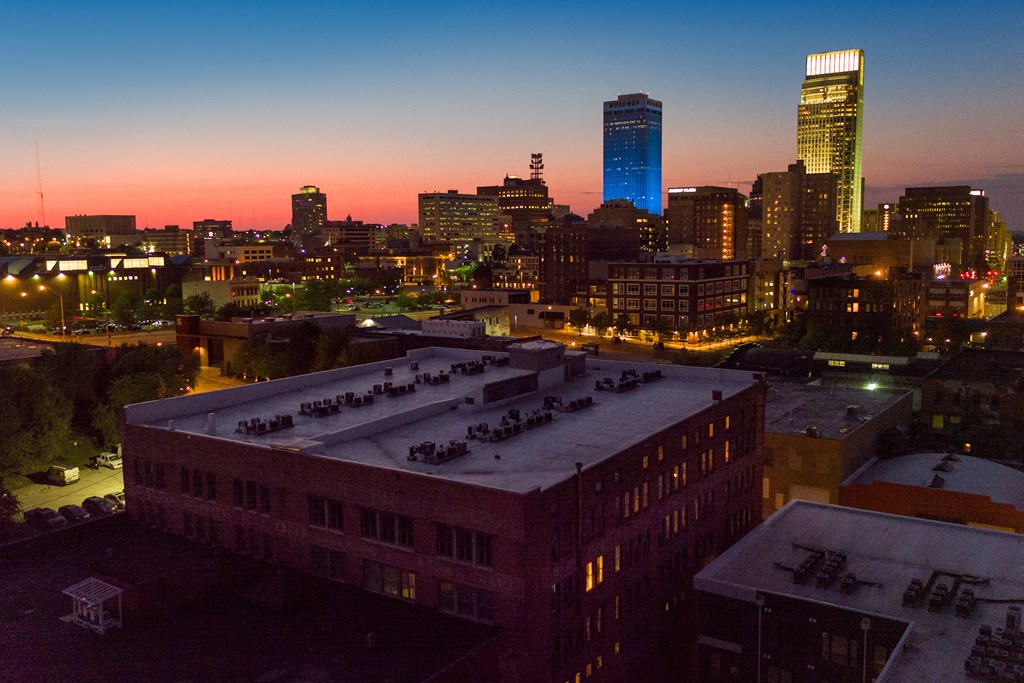 a view of the skyline at night in the city