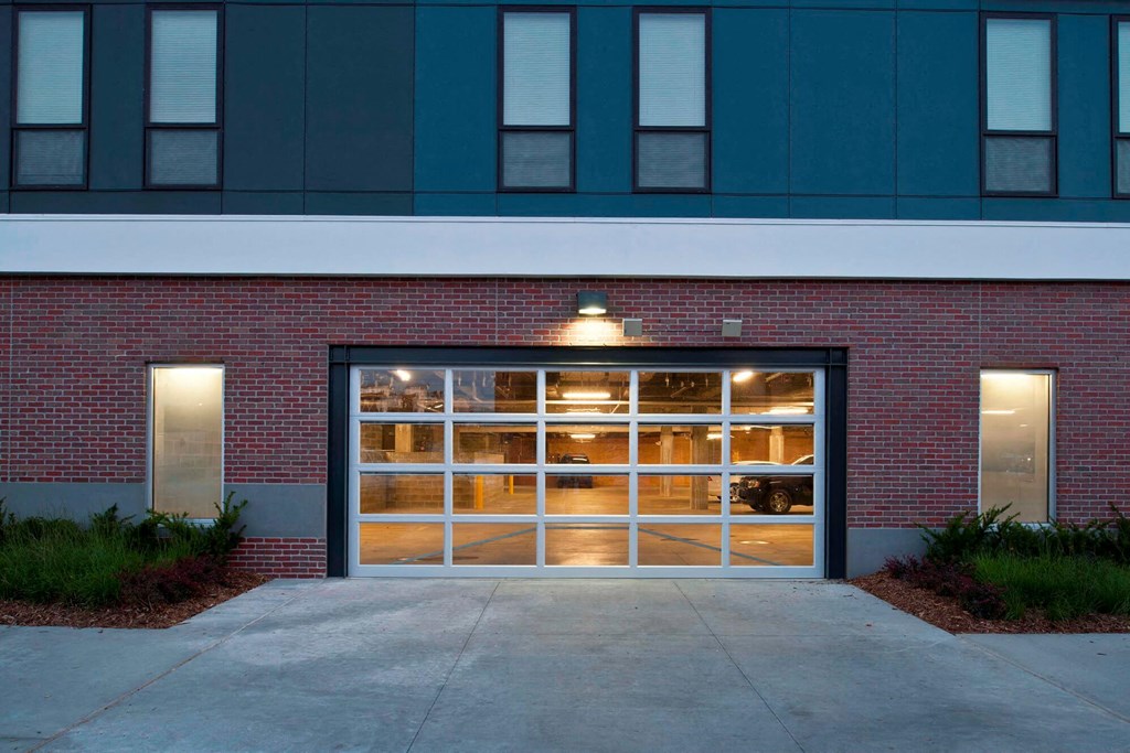 a large garage door on the side of a brick building