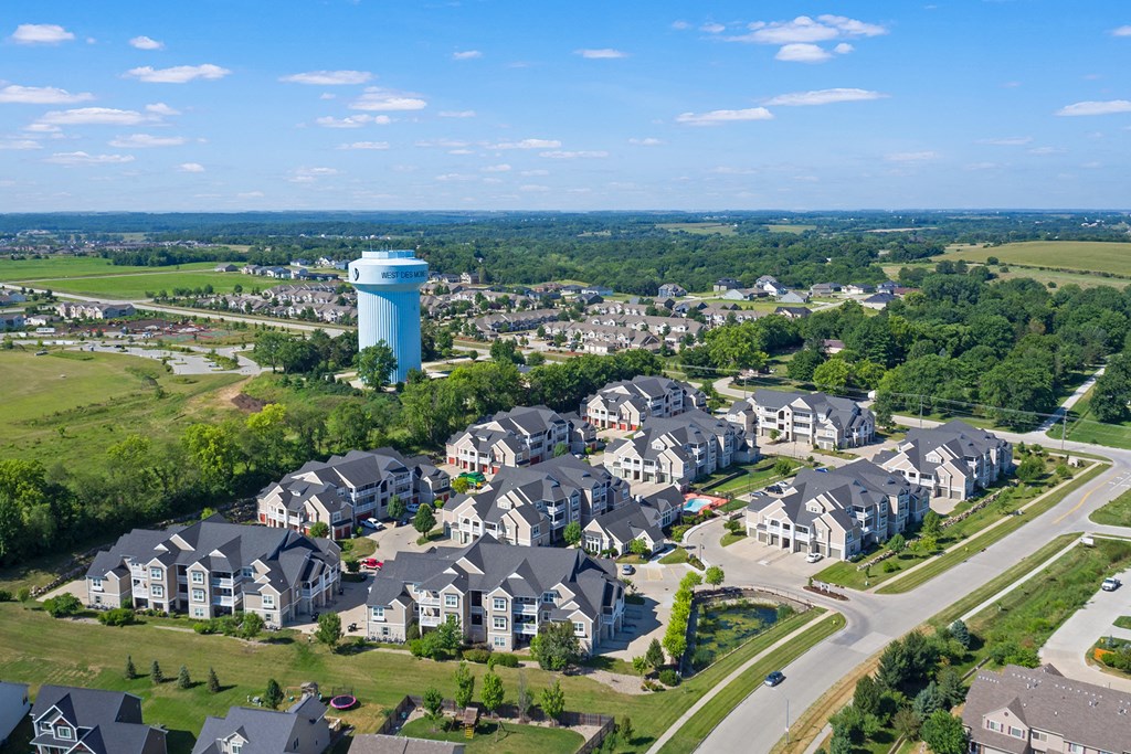 a suburb of a city with a water tower